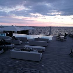 Scenic view of sea against sky at sunset