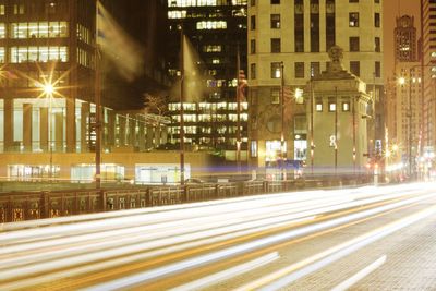 Light trails on city street at night