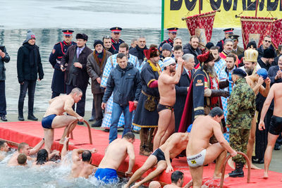 Group of people enjoying in water