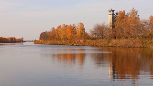 Scenic view of lake against sky during autumn