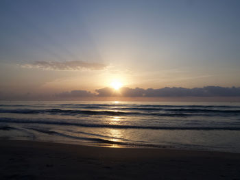 Scenic view of sunset over sea