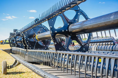 Low angle view of railroad track against sky