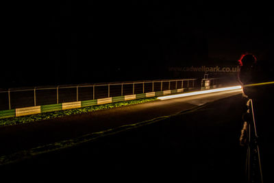 Light trails on road at night