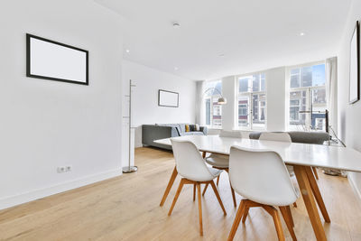 Empty chairs on table at home