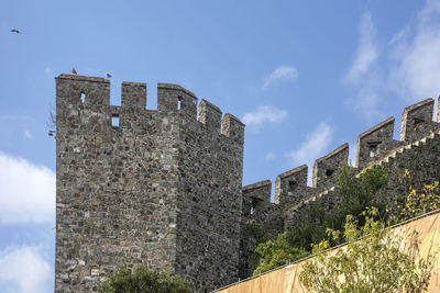 Low angle view of fort against sky