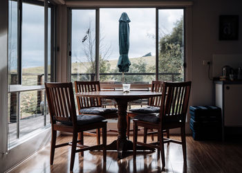 Empty chairs and table at home