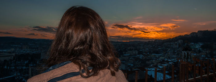 Woman at beach during sunset