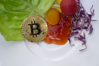High angle view of chopped fruits in plate on table