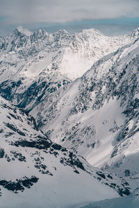 Scenic view of snow covered mountains