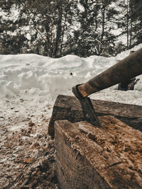 Close-up of chain on snow covered land