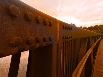 Low angle view of railings against sky