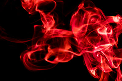 Close-up of fire against black background