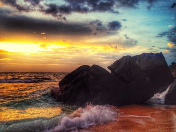 Scenic view of sea at sunset