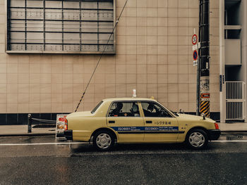 Car on street against building