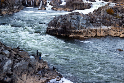 High angle view of rocks in sea