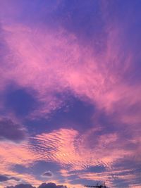 Low angle view of dramatic sky during sunset