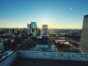 Modern buildings in city against sky