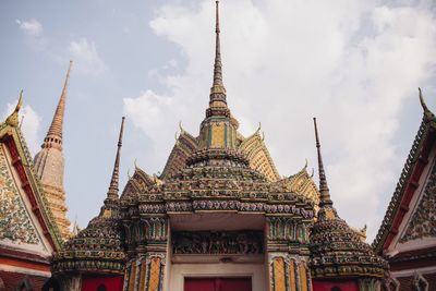 Low angle view of cathedral against cloudy sky