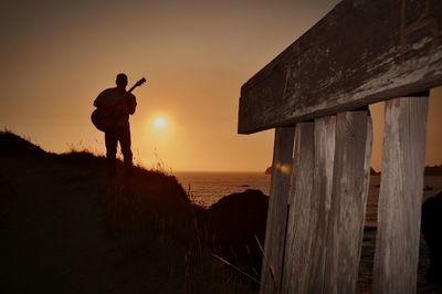 Scenic view of sea at sunset