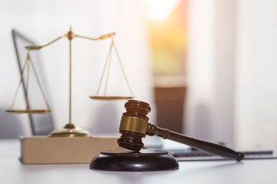 Close-up of electric lamp on table