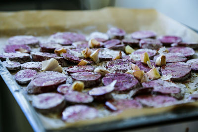 Close-up of chopped sweet potato on cutting board 