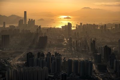 Panoramic view of buildings against sky during sunset