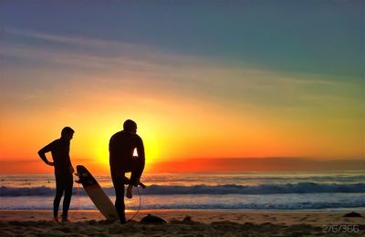 Scenic view of sea at sunset