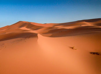 Scenic view of desert against sky