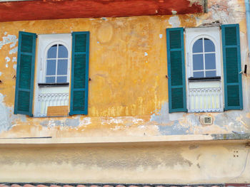 Closed window of old building