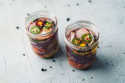 High angle view of glass jar on table