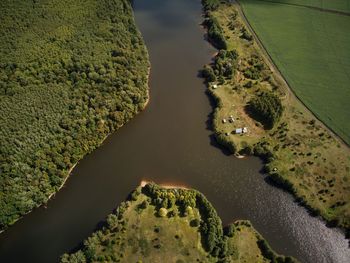 High angle view of sea and land