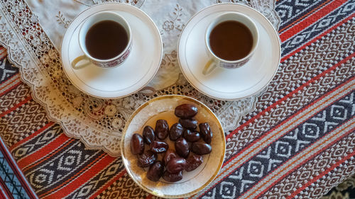 High angle view of coffee cup on table