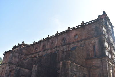 Low angle view of old building against sky