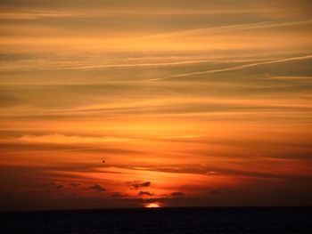 Scenic view of sea at sunset