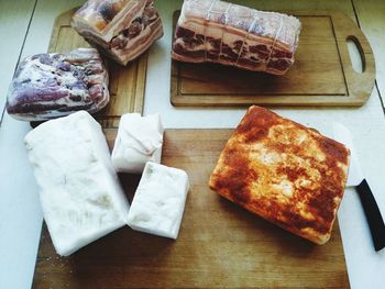 High angle view of bread on cutting board