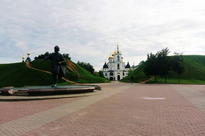 View of temple against cloudy sky