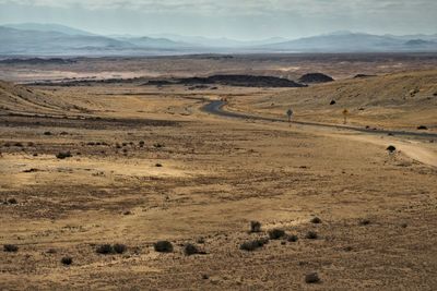 Scenic view of desert against sky