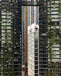 Low angle view of modern buildings in city