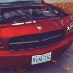 Close-up of car on road