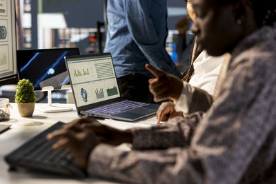Man using laptop at table