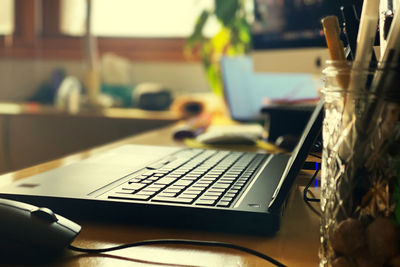 Close-up of laptop on table