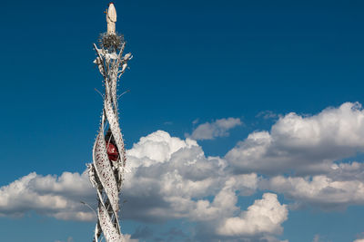 Low angle view of airshow against blue sky