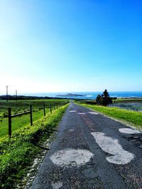 View of empty road along landscape