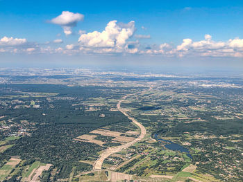 Aerial view of city against sky
