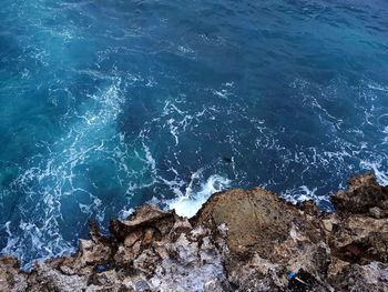 High angle view of rocks on beach