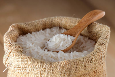 Close-up of rice in sack