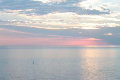 Scenic view of calm sea at sunset