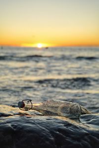 Scenic view of sea during sunset