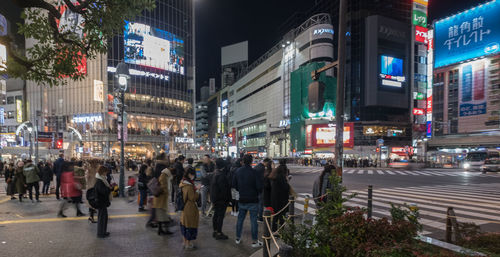 Crowd in city at night