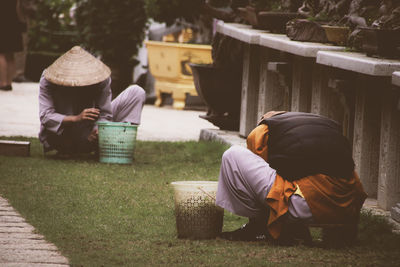 Men sitting in park